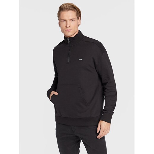 Calvin Klein Bluza K10K110627 Czarny Relaxed Fit ze sklepu MODIVO w kategorii Bluzy męskie - zdjęcie 182719525