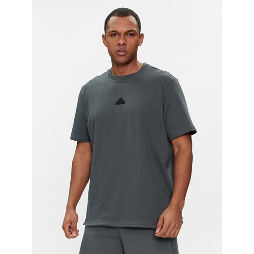 adidas T-Shirt City Escape IN3709 Zielony Loose Fit ze sklepu MODIVO w kategorii T-shirty męskie - zdjęcie 182719617
