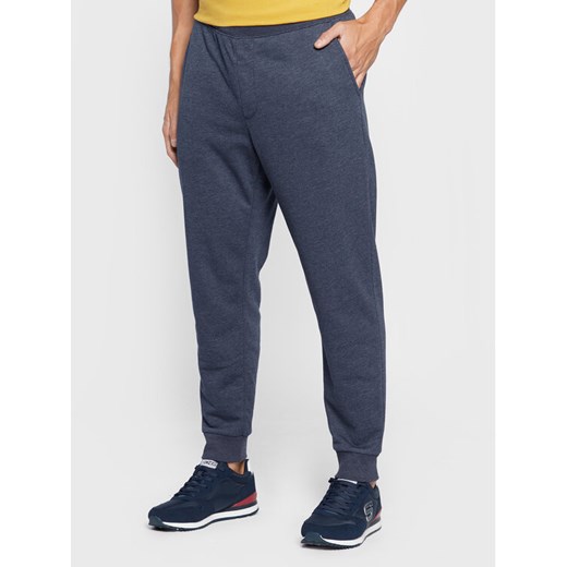 Skechers Spodnie dresowe Expedition M1PT57 Granatowy Regular Fit ze sklepu MODIVO w kategorii Spodnie męskie - zdjęcie 182719895
