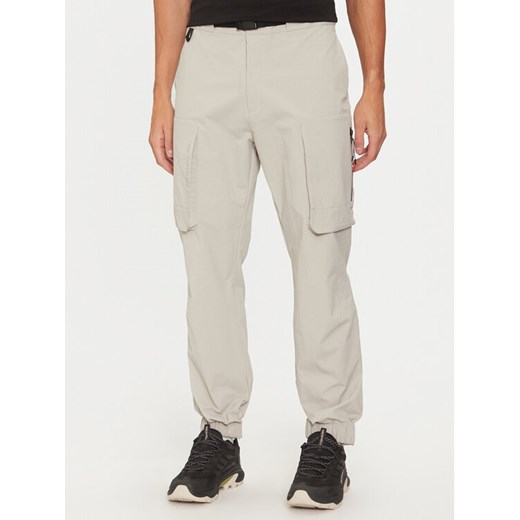 Helly Hansen Spodnie żeglarskie Arc 22 53725 Beżowy Regular Fit ze sklepu MODIVO w kategorii Spodnie męskie - zdjęcie 182719926
