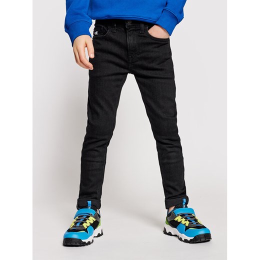 Calvin Klein Jeans Jeansy IB0IB00766 Czarny Slim Fit ze sklepu MODIVO w kategorii Spodnie chłopięce - zdjęcie 182720326