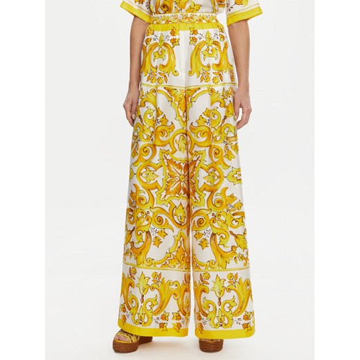 Dolce&Gabbana Spodnie materiałowe FTC63T HI1BE HG3TN Żółty Regular Fit ze sklepu MODIVO w kategorii Spodnie damskie - zdjęcie 182720398
