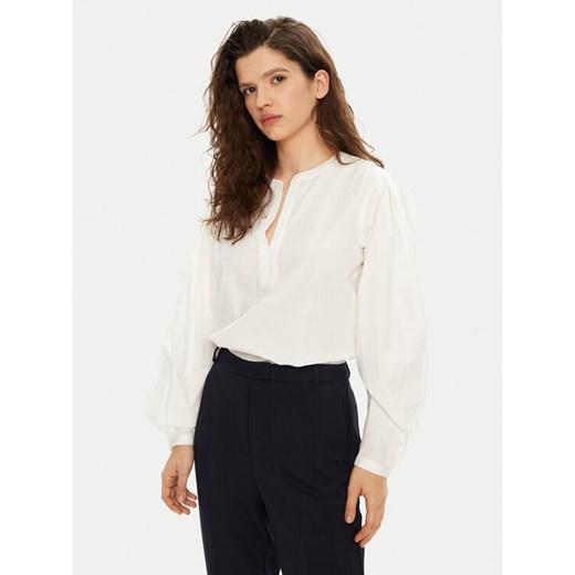 Tommy Hilfiger Bluzka WW0WW44059 Biały Relaxed Fit ze sklepu MODIVO w kategorii Bluzki damskie - zdjęcie 182720609