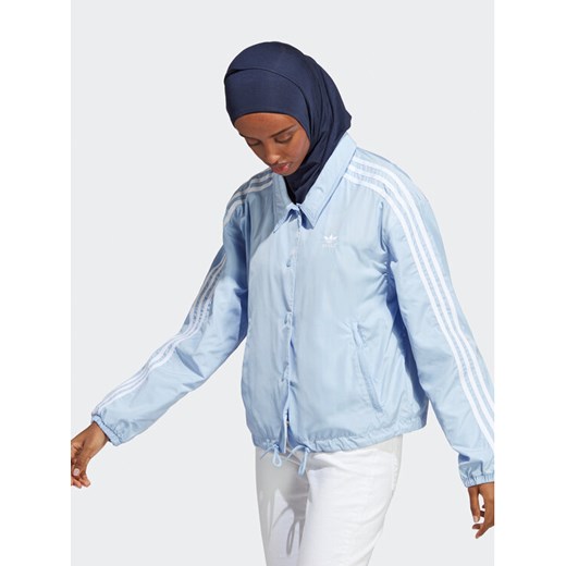 adidas Kurtka przejściowa Adicolor Classics 3-Stripes Coach Jacket IC5480 Błękitny Loose Fit ze sklepu MODIVO w kategorii Kurtki damskie - zdjęcie 182721296