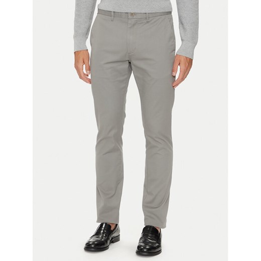 Tommy Hilfiger Chinosy Bleecker MW0MW26619 Szary Slim Fit ze sklepu MODIVO w kategorii Spodnie męskie - zdjęcie 182721599