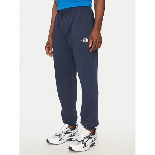 The North Face Spodnie dresowe Simple Dome Light NF0A8C41 Granatowy Regular Fit ze sklepu MODIVO w kategorii Spodnie męskie - zdjęcie 182721828