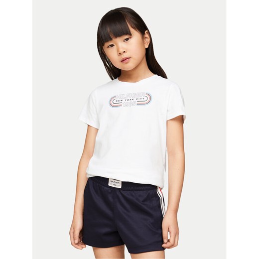 Tommy Hilfiger T-Shirt 1985 KG0KG07858 Biały Regular Fit ze sklepu MODIVO w kategorii Bluzki dziewczęce - zdjęcie 182722559