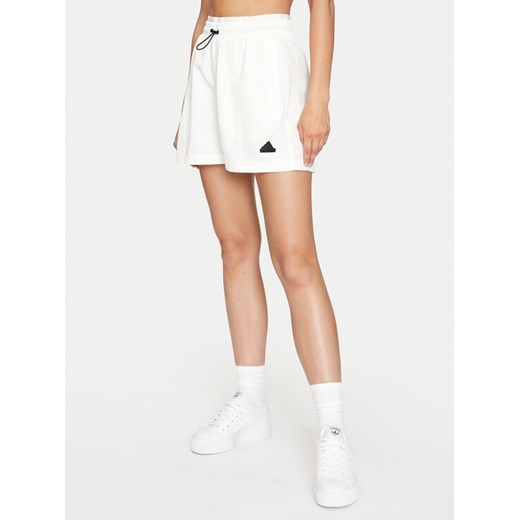adidas Szorty sportowe City Escape Woven IW5208 Biały Loose Fit ze sklepu MODIVO w kategorii Szorty - zdjęcie 182723307