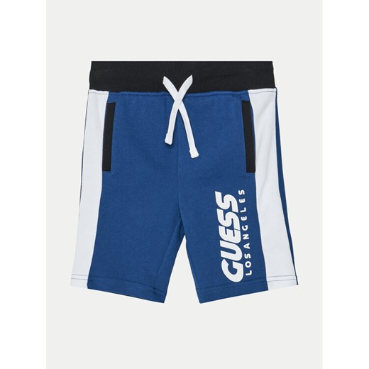 Guess Szorty sportowe L5RD01 KA6R4 Niebieski Regular Fit ze sklepu MODIVO w kategorii Spodenki chłopięce - zdjęcie 182723499