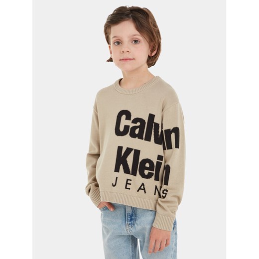 Calvin Klein Jeans Sweter Blown Up Logo IB0IB01874 Beżowy Regular Fit ze sklepu MODIVO w kategorii Swetry chłopięce - zdjęcie 182723507