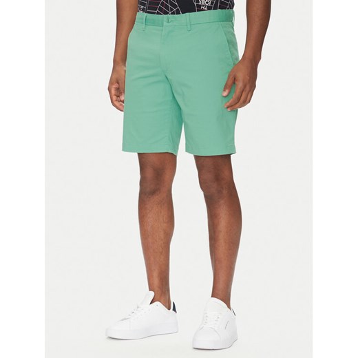 Tommy Hilfiger Szorty materiałowe Brooklyn MW0MW23563 Zielony Regular Fit ze sklepu MODIVO w kategorii Spodenki męskie - zdjęcie 182723517