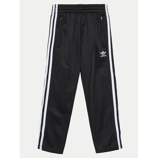 adidas Spodnie dresowe Firebird IY9805 Czarny Regular Fit ze sklepu MODIVO w kategorii Spodnie chłopięce - zdjęcie 182723609