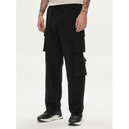 Jack&Jones Spodnie materiałowe Karl 12253626 Czarny Loose Fit ze sklepu MODIVO w kategorii Spodnie męskie - zdjęcie 182724867