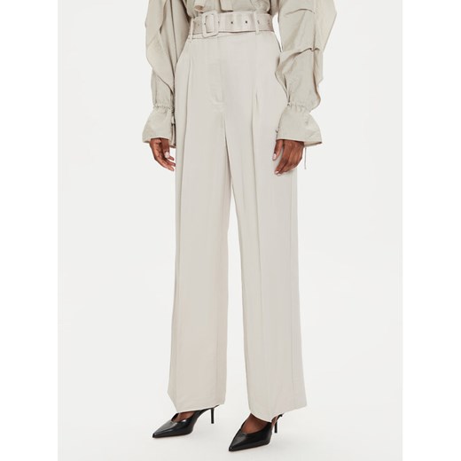 Karen by Simonsen Spodnie materiałowe Priscilla 10105042 Beżowy Loose Fit ze sklepu MODIVO w kategorii Spodnie damskie - zdjęcie 182725335
