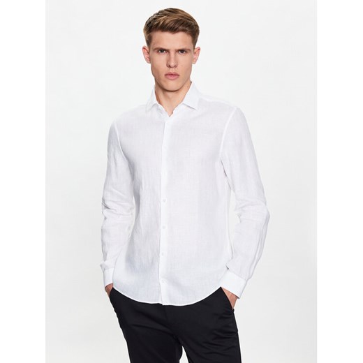 Calvin Klein Koszula Solid K10K109286 Biały Slim Fit ze sklepu MODIVO w kategorii Koszule męskie - zdjęcie 182726145