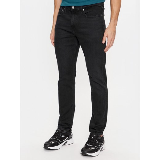 Calvin Klein Jeans Jeansy J30J323689 Czarny Tapered Fit ze sklepu MODIVO w kategorii Jeansy męskie - zdjęcie 182726359