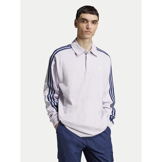 adidas Polo adicolor Rugby JC9916 Fioletowy Regular Fit ze sklepu MODIVO w kategorii T-shirty męskie - zdjęcie 182726948