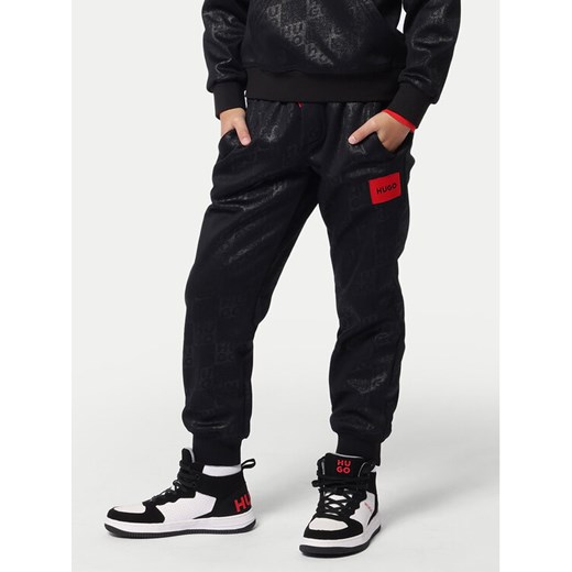 Hugo Spodnie dresowe G00180 M Czarny Regular Fit ze sklepu MODIVO w kategorii Spodnie chłopięce - zdjęcie 182729756