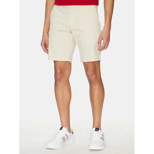 Tommy Hilfiger Szorty materiałowe Brooklyn MW0MW23563 Beżowy Regular Fit ze sklepu MODIVO w kategorii Spodenki męskie - zdjęcie 182730085