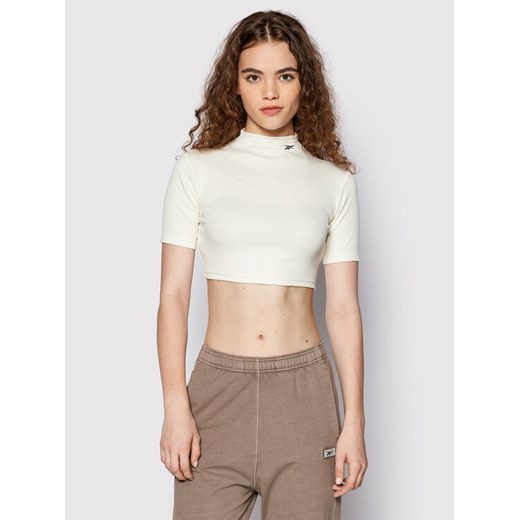 Reebok Bluzka HH7370 Beżowy Slim Fit ze sklepu MODIVO w kategorii Bluzki damskie - zdjęcie 182731406