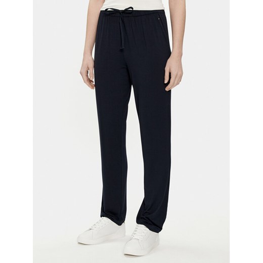 Tommy Hilfiger Spodnie dresowe UW0UW02842 Granatowy Regular Fit ze sklepu MODIVO w kategorii Spodnie damskie - zdjęcie 182731529