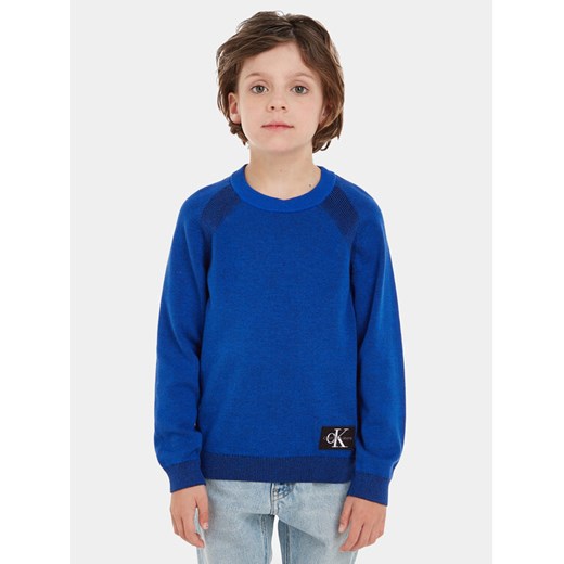 Calvin Klein Jeans Sweter IB0IB01868 Niebieski Regular Fit ze sklepu MODIVO w kategorii Swetry chłopięce - zdjęcie 182731647