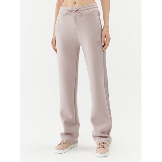 Guess Spodnie dresowe Brenda V3RB21 K7UW2 Beżowy Regular Fit ze sklepu MODIVO w kategorii Spodnie damskie - zdjęcie 182732588
