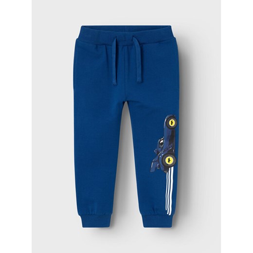 NAME IT Spodnie dresowe BATMAN Jacobo 13225935 Niebieski Regular Fit ze sklepu MODIVO w kategorii Spodnie i półśpiochy - zdjęcie 182733757