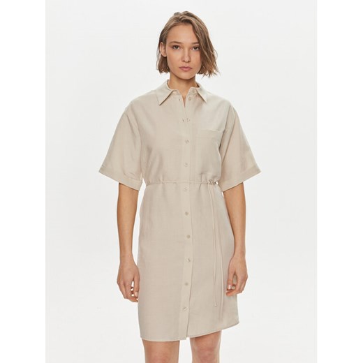Calvin Klein Sukienka koszulowa K20K206697 Beżowy Relaxed Fit ze sklepu MODIVO w kategorii Sukienki - zdjęcie 182733767