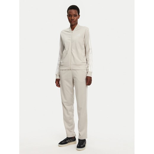 adidas Dres Essentials 3-Stripes JD2686 Beżowy Regular Fit ze sklepu MODIVO w kategorii Dresy damskie - zdjęcie 182733817