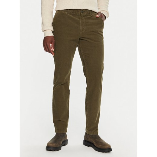 Tommy Hilfiger Spodnie materiałowe MW0MW32932 Khaki Regular Fit ze sklepu MODIVO w kategorii Spodnie męskie - zdjęcie 182733958