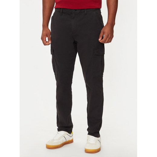 Tommy Jeans Spodnie materiałowe Austin DM0DM20750 Czarny Slim Fit ze sklepu MODIVO w kategorii Spodnie męskie - zdjęcie 182735475