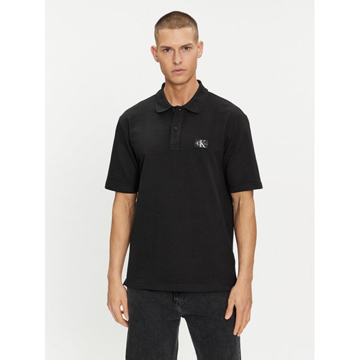 Calvin Klein Jeans Polo J30J325433 Czarny Regular Fit ze sklepu MODIVO w kategorii T-shirty męskie - zdjęcie 182738128