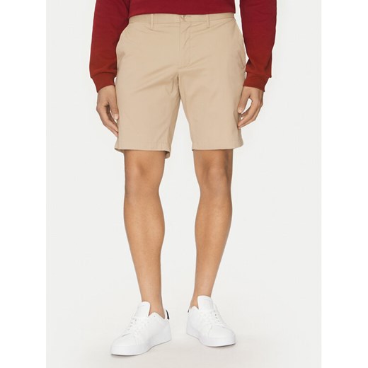 Tommy Hilfiger Szorty materiałowe Brooklyn MW0MW23563 Beżowy Regular Fit ze sklepu MODIVO w kategorii Spodenki męskie - zdjęcie 182739757