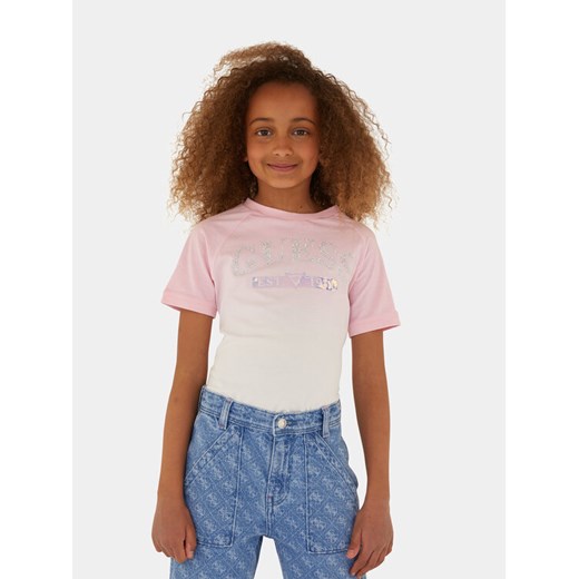 Guess T-Shirt J4RI12 K8HM4 Różowy Regular Fit ze sklepu MODIVO w kategorii Bluzki dziewczęce - zdjęcie 182740696