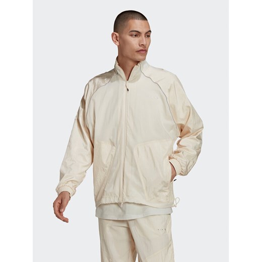 adidas Bluza Reveal Material Mix HK2729 Beżowy Regular Fit ze sklepu MODIVO w kategorii Bluzy męskie - zdjęcie 182742516