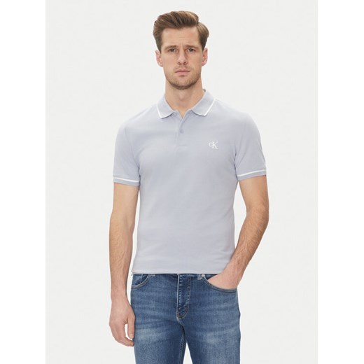 Calvin Klein Jeans Polo J30J315603 Niebieski Slim Fit ze sklepu MODIVO w kategorii T-shirty męskie - zdjęcie 182743846