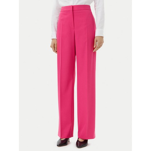HUGO Spodnie materiałowe Hambali 50537611 Różowy Relaxed Fit ze sklepu MODIVO w kategorii Spodnie damskie - zdjęcie 182744716