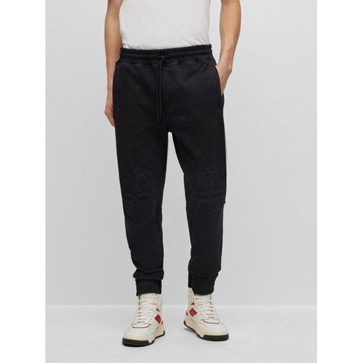 Boss Spodnie dresowe 50495288 Czarny Relaxed Fit ze sklepu MODIVO w kategorii Spodnie męskie - zdjęcie 182744737