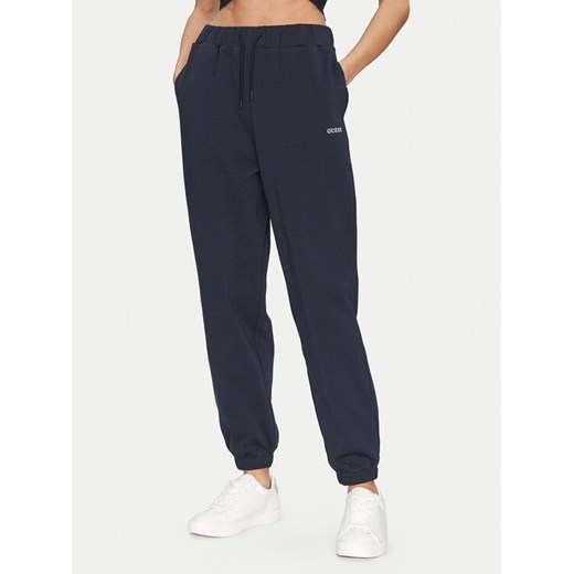 Guess Spodnie dresowe V5GB03 KCS01 Granatowy Regular Fit ze sklepu MODIVO w kategorii Spodnie damskie - zdjęcie 182745725