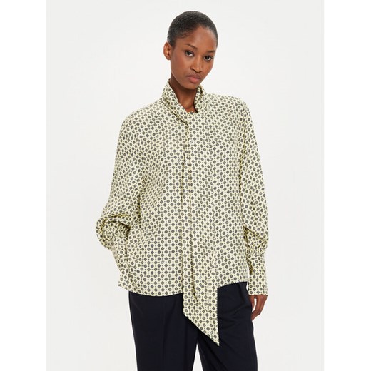 Tommy Hilfiger Bluzka WW0WW42294 Żółty Relaxed Fit ze sklepu MODIVO w kategorii Bluzki damskie - zdjęcie 182745749