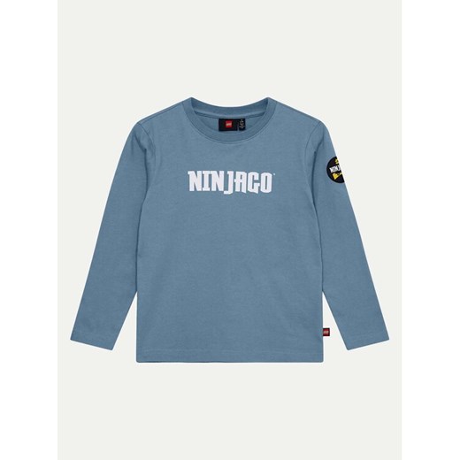 LEGO Bluzka Ninjago 12011275 Niebieski Regular Fit ze sklepu MODIVO w kategorii T-shirty chłopięce - zdjęcie 182746435