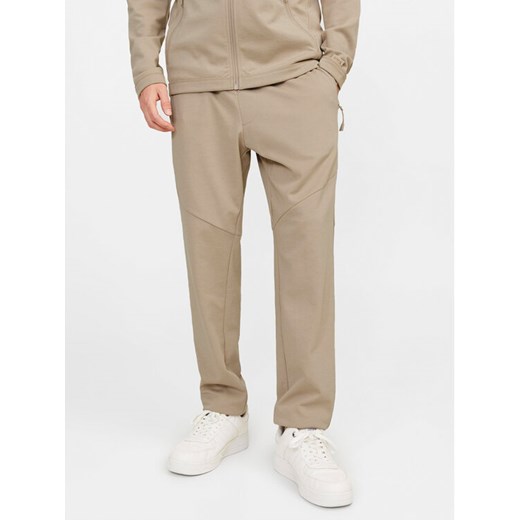Jack&Jones Spodnie dresowe Will 12253727 Beżowy Slim Fit ze sklepu MODIVO w kategorii Spodnie męskie - zdjęcie 182747658