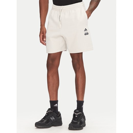 adidas Szorty sportowe Star Wars The Mandalorian™ JI5721 Beżowy Regular Fit ze sklepu MODIVO w kategorii Spodenki męskie - zdjęcie 182748258