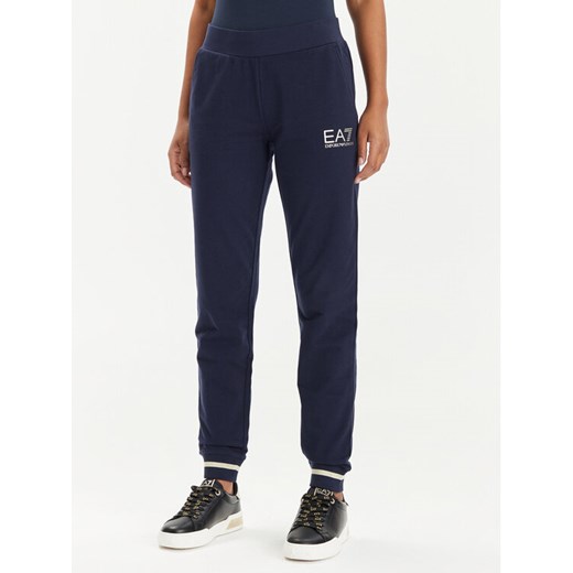EA7 Emporio Armani Spodnie dresowe 8NTP67 TJTXZ 1554 Granatowy Regular Fit ze sklepu MODIVO w kategorii Spodnie damskie - zdjęcie 182748275