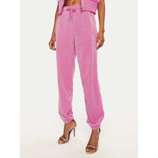 Juicy Couture Spodnie dresowe Lilian JCWB121093 Różowy Regular Fit ze sklepu MODIVO w kategorii Spodnie damskie - zdjęcie 182748298