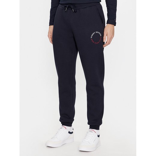 Tommy Hilfiger Spodnie dresowe MW0MW32701 Granatowy Regular Fit ze sklepu MODIVO w kategorii Spodnie męskie - zdjęcie 182748986