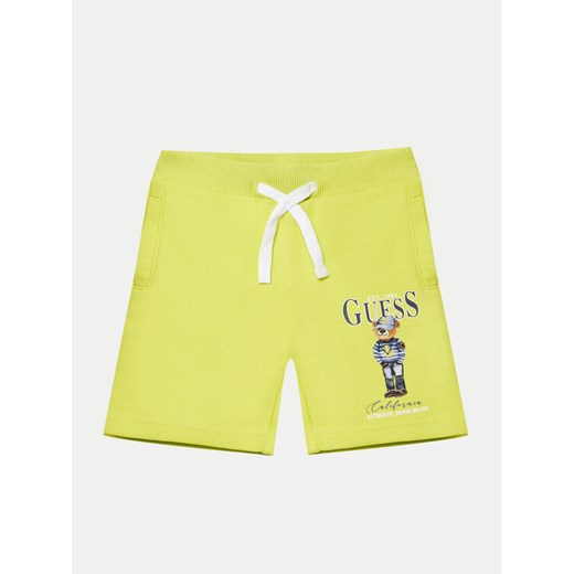 Guess Szorty materiałowe N5RD03 KAD74 Żółty Regular Fit ze sklepu MODIVO w kategorii Spodenki chłopięce - zdjęcie 182749498