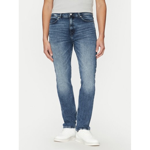 HUGO Jeansy 50530587 Niebieski Slim Fit ze sklepu MODIVO w kategorii Jeansy męskie - zdjęcie 182749639