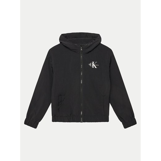 Calvin Klein Jeans Kurtka przejściowa Essential IB0IB02500 Czarny Regular Fit ze sklepu MODIVO w kategorii Kurtki chłopięce - zdjęcie 182749937